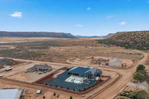 View of rural area featuring a desert landscape and mountains