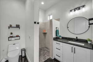 Full bath featuring vanity and a walk in shower