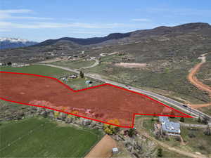 View of property location featuring mountains and property parcel outlined