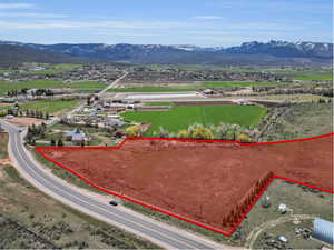 View of property location with mountains and property parcel outlined