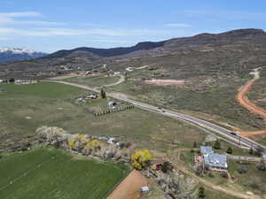 View of property location featuring a mountainous background and rural landscape