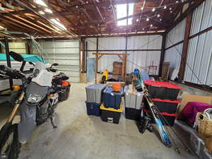 Garage featuring metal wall