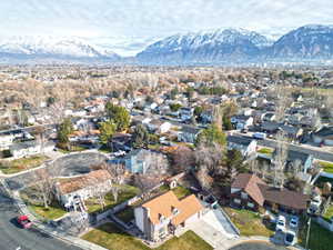 Aerial view of residential area featuring mountains