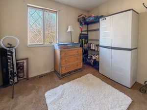 Bedroom with baseboards and a textured ceiling