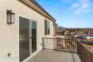 Balcony with a mountain view and a residential view