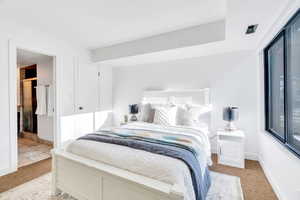 Master bedroom with closet and attached bath