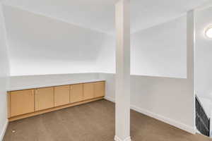 Loft space/additional sleeping area. Accommodates 2 twins or a queen bed