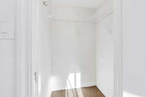 Second bedroom closet with shelving