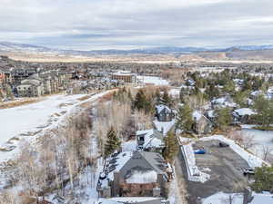 Aerial view of proximity to golf course and Frostwood Gondola