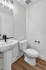 Bathroom with wood finished floors