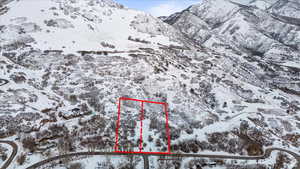 Snowy aerial view with a mountain view