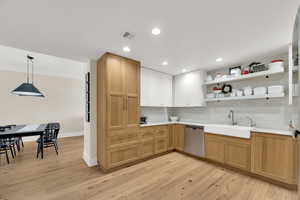 Kitchen with Taj Mahal Quartzite counters.