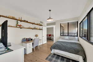 Bedroom with an office area.