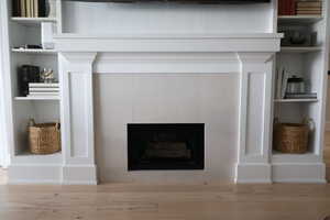 Detailed view of a tiled fireplace shelves