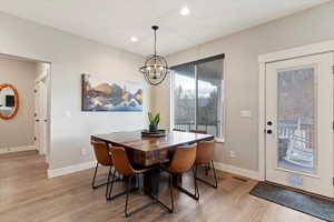 Large dining space with upgraded light fixture
