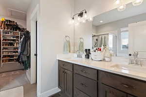 Double vanity, quartz tops, walk-in closet