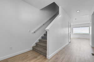 Stairs with wood finished floors