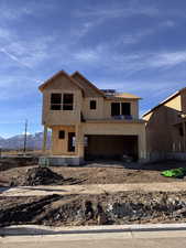 Property in mid-construction with a mountain view