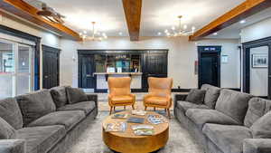Common area featuring beam ceiling and recessed lighting
