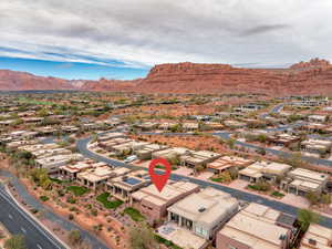 Aerial view of residential area featuring mountains
