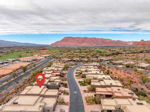 Aerial view of residential area with a mountainous background