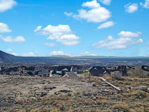 View of mountain backdrop with nearby suburban area