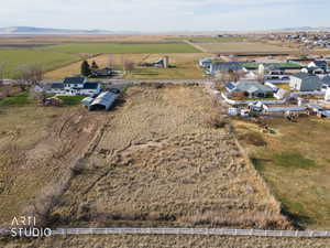 Aerial view of sparsely populated area featuring a mountain backdrop