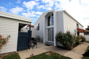 Entrance from carport into the yard.