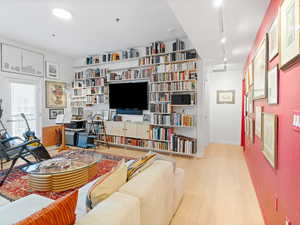 With floor to ceiling bookshelves (built-in, cost @$5K)