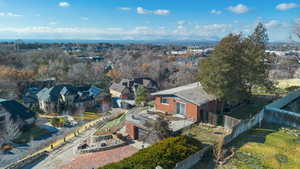 View of property location with nearby suburban area