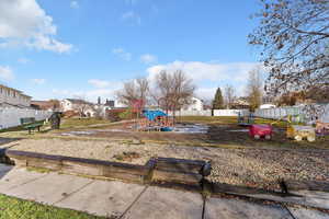 View of play area with a residential view