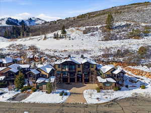 Snowy aerial view with a mountain view