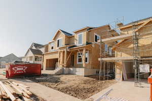 Property in mid-construction with a residential view