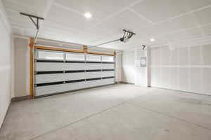 Garage featuring electric panel
