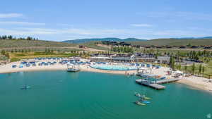 Bird's eye view of a pool and a water and mountain view