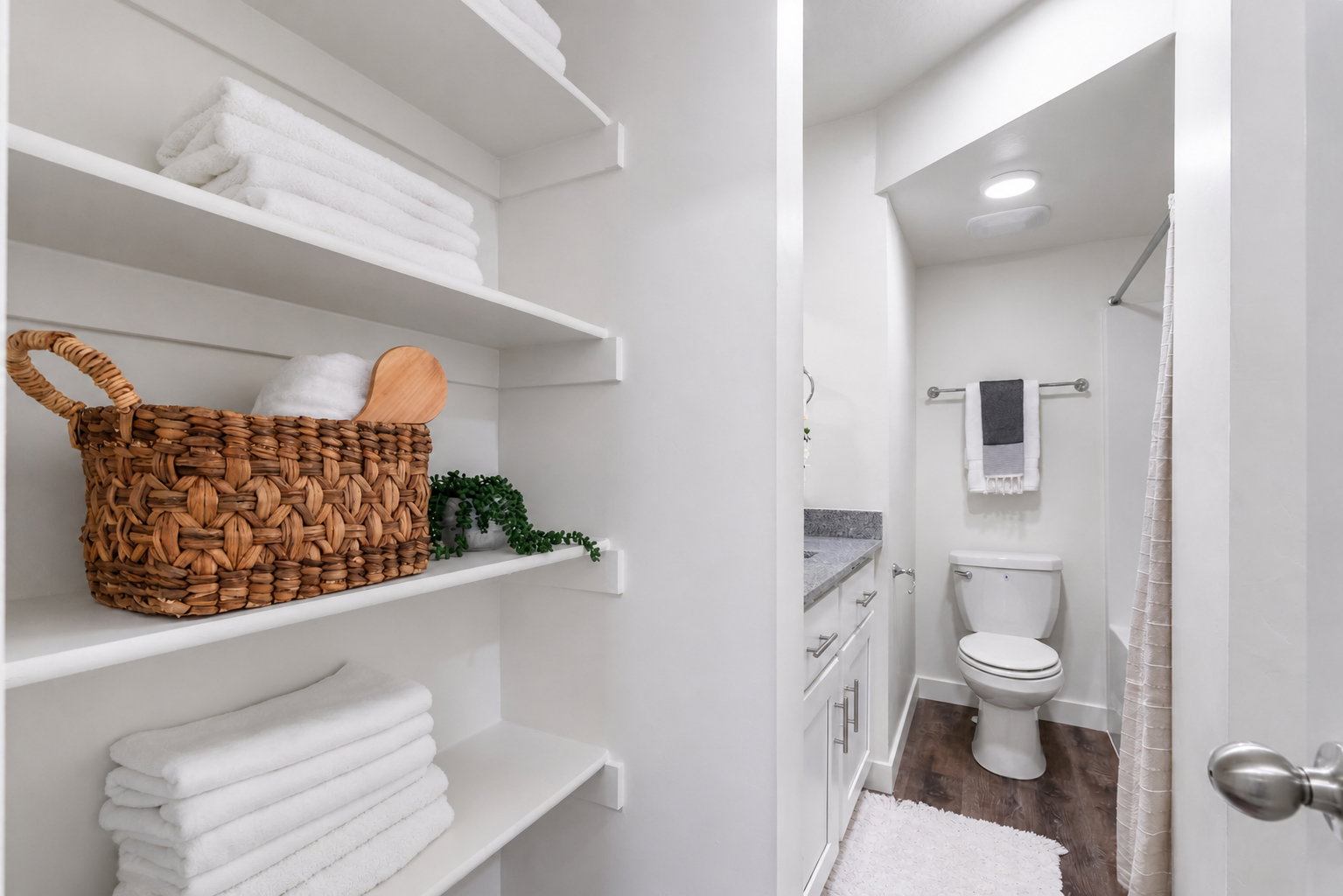 Full bath with vanity, dark wood-type flooring, and shower / bath combination with curtain