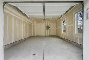 Garage featuring electric panel