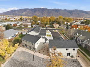 Aerial view of residential area with a mountain backdrop