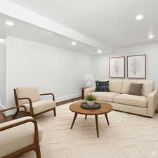 Living room featuring recessed lighting and baseboards