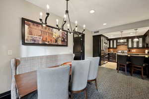 Dining space with recessed lighting