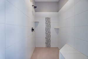 Bathroom featuring tiled shower