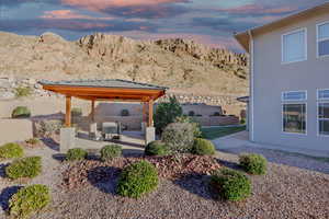View of yard featuring a patio area and a mountain view