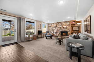 Basement family room with door to backyard & patio