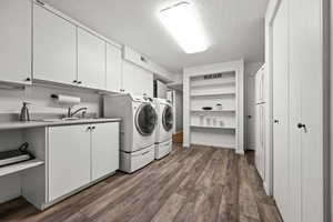 Basement kitchen and laundry area with builtin shelves & storage closets