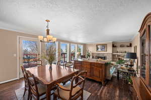 Dining room with door to deck and backyard