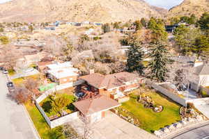Aerial view of residential area featuring a mountain backdrop