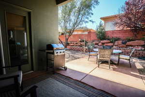 View of patio / terrace featuring a grill and outdoor dining area