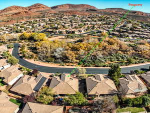 Aerial perspective of suburban area featuring mountains