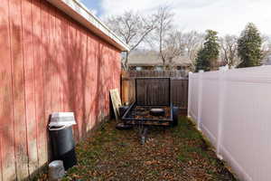View of fenced backyard