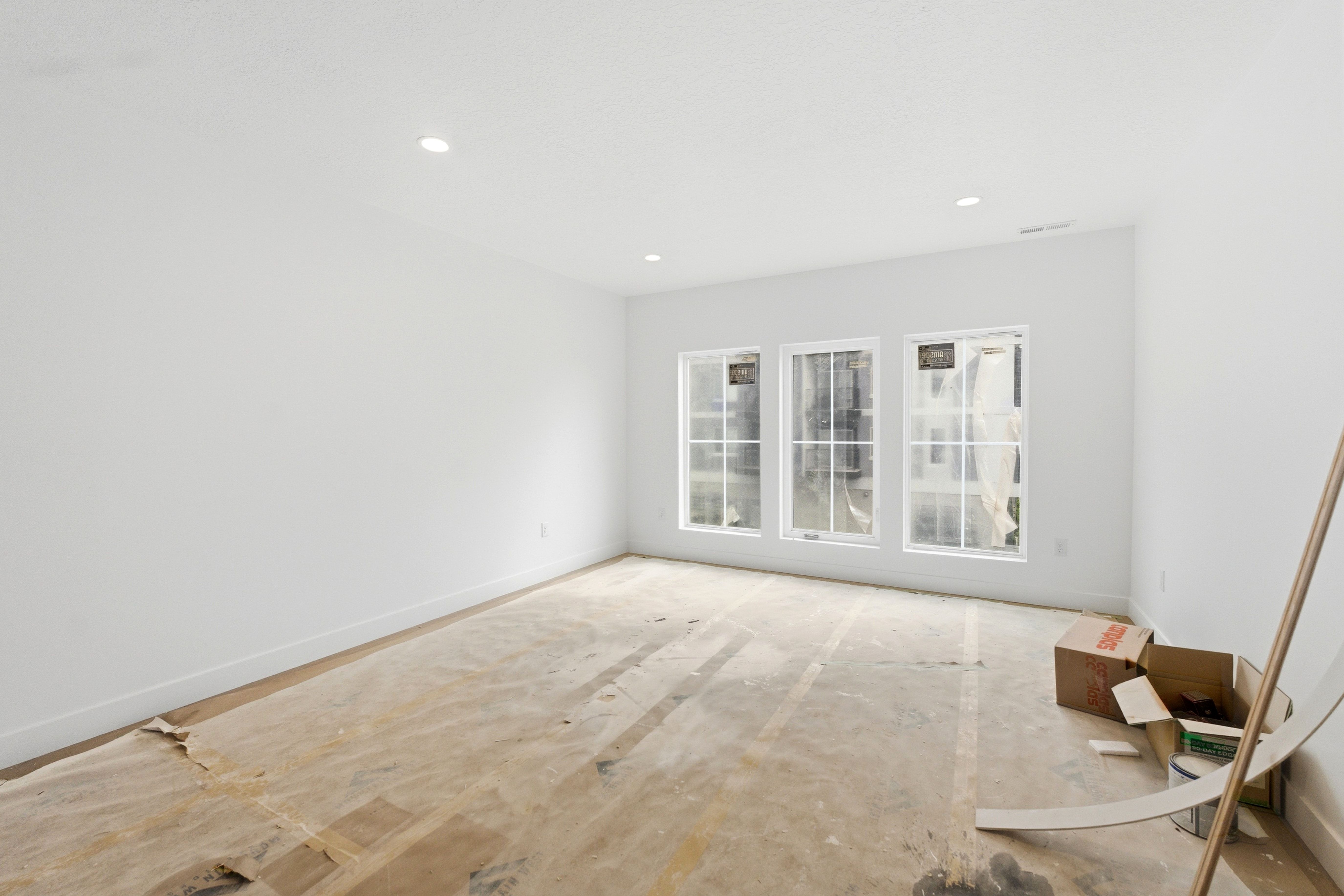 Empty room featuring baseboards